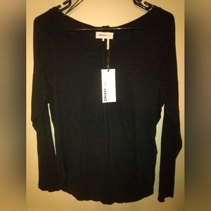 A DKNY black  long sleeve shirt size medium